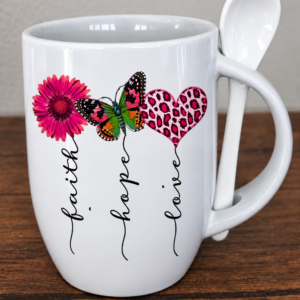 White mug wit spoon - "Faith, hope, love "